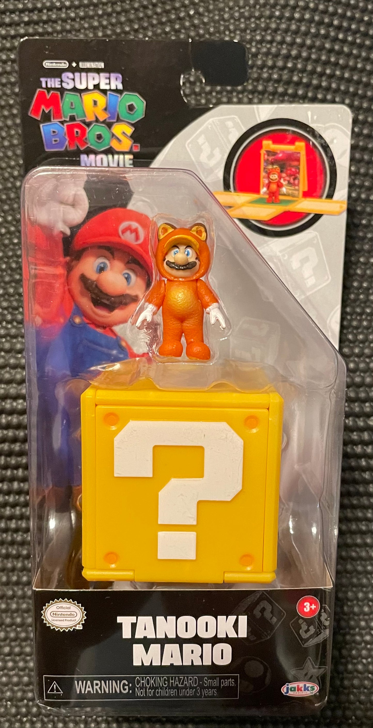 Super Mario Bros. Movie Tanooki Mario Mini 1” Action Figure & Question Box Display Stand
